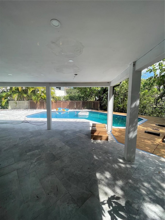 5811 SW 33rd Ter, Hollywood, FL 33312 - view of swimming pool featuring a fenced backyard and a patio area