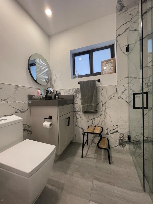 5811 SW 33rd Ter, Hollywood, FL 33312 - full bathroom with tile walls, a marble finish shower, vanity, and a wainscoted wall
