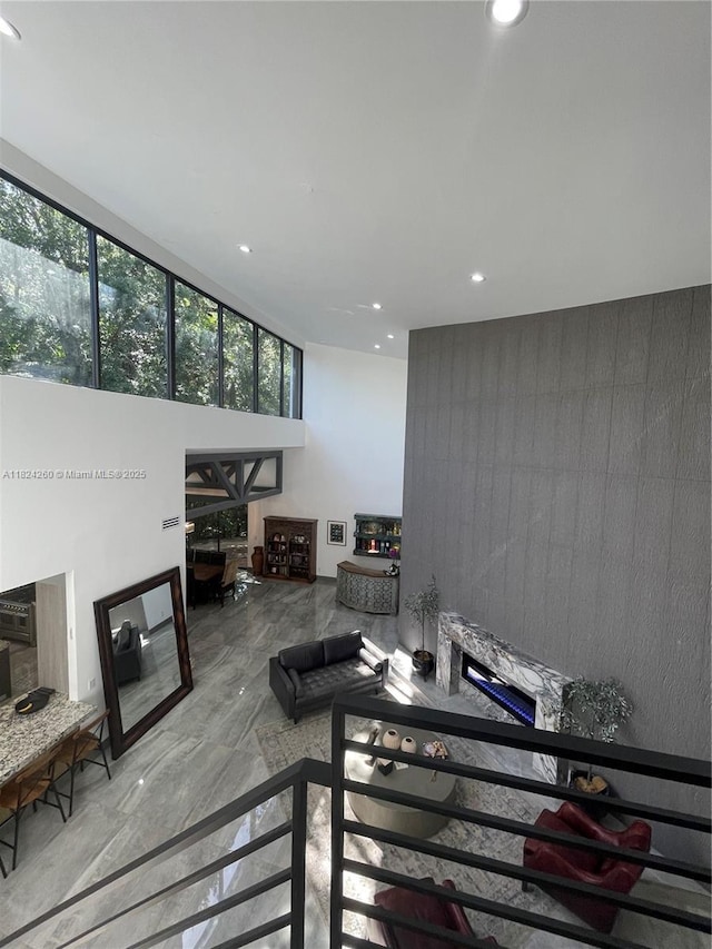 5811 SW 33rd Ter, Hollywood, FL 33312 - living room with recessed lighting and marble tiled flooring