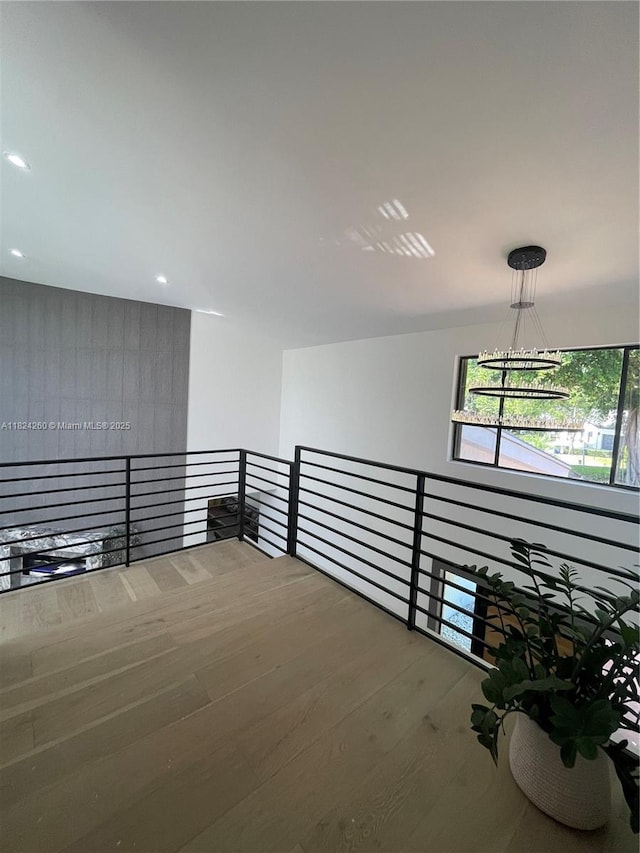 5811 SW 33rd Ter, Hollywood, FL 33312 - hallway with wood finished floors, recessed lighting, and a chandelier