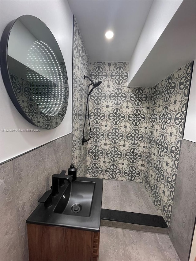 5811 SW 33rd Ter, Hollywood, FL 33312 - full bath featuring tile walls, tiled shower, vanity, and wainscoting