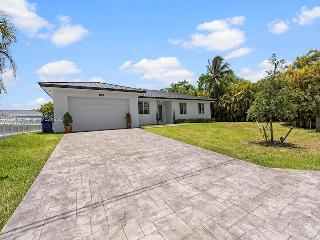 18100 SW 175th St, Miami, FL 33187 - single story home featuring decorative driveway, stucco siding, an attached garage, a standing seam roof, and a metal roof