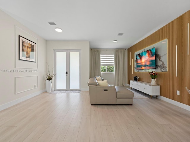 18100 SW 175th St, Miami, FL 33187 - living room with wooden walls and light wood-type flooring