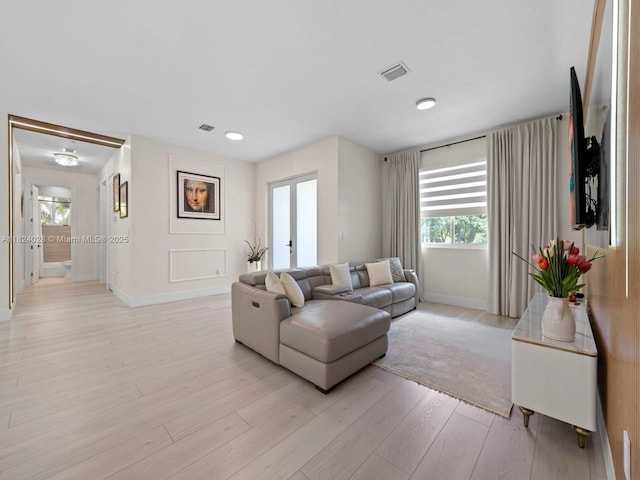18100 SW 175th St, Miami, FL 33187 - living room featuring baseboards and light wood-style floors