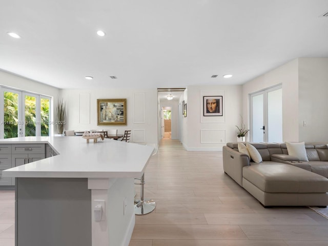 18100 SW 175th St, Miami, FL 33187 - kitchen featuring french doors, open floor plan, light countertops, recessed lighting, and light wood-style floors