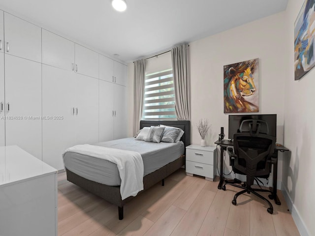 18100 SW 175th St, Miami, FL 33187 - bedroom featuring light wood-type flooring and a closet
