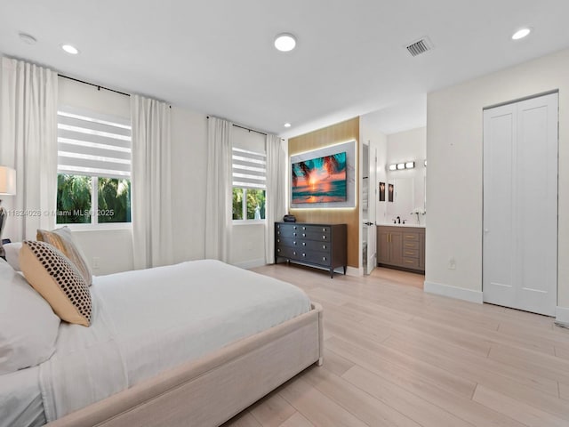 18100 SW 175th St, Miami, FL 33187 - bedroom with recessed lighting, light wood-style floors, and ensuite bath