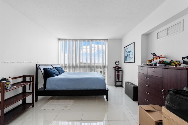 1861 NW S River Dr Unit Ph-01, Miami, FL 33125 - bedroom with light tile patterned flooring
