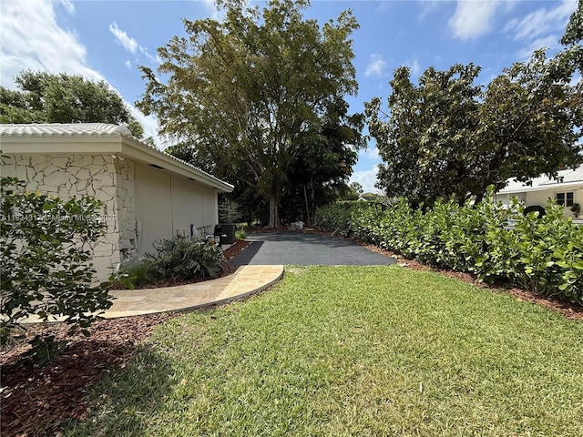 8845 SW 176th Ter, Palmetto Bay, FL 33157 - view of grassy yard with driveway