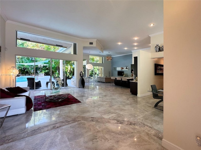 375 Sabal Way, Weston, FL 33326 - living area with crown molding, light marble finish floors, and recessed lighting