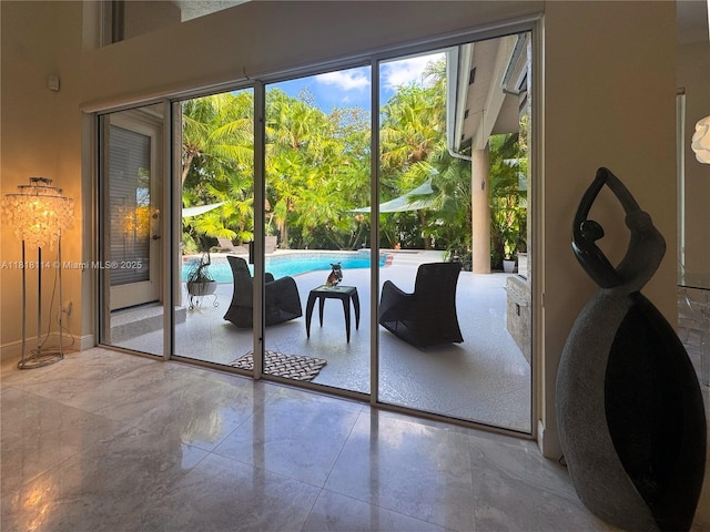 375 Sabal Way, Weston, FL 33326 - doorway to outside featuring baseboards
