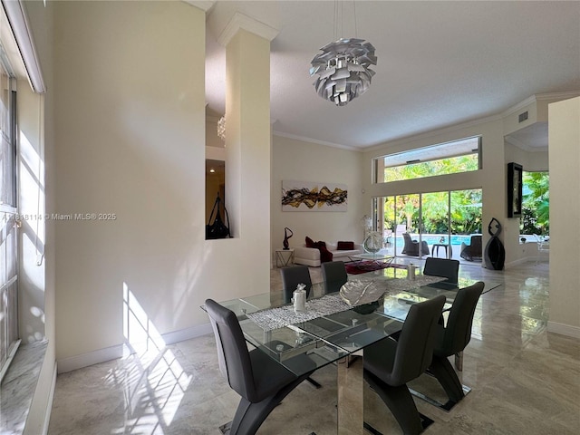 375 Sabal Way, Weston, FL 33326 - dining area featuring crown molding and baseboards