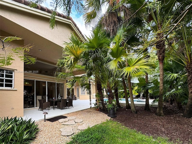 375 Sabal Way, Weston, FL 33326 - view of yard featuring a patio area and an outdoor pool