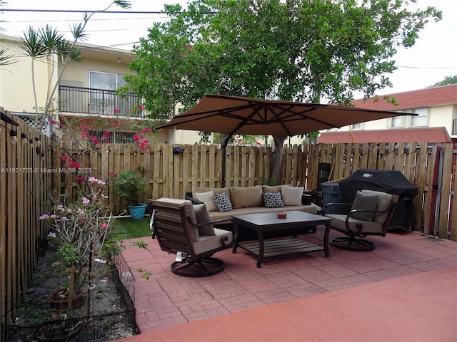 6680 SW 41st Pl Unit 32, Davie, FL 33314 - view of patio / terrace with an outdoor hangout area and a grill