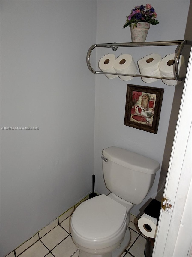 6680 SW 41st Pl Unit 32, Davie, FL 33314 - bathroom with tile patterned floors and toilet