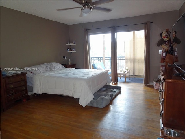 6680 SW 41st Pl Unit 32, Davie, FL 33314 - bedroom with wood finished floors, access to outside, and ceiling fan