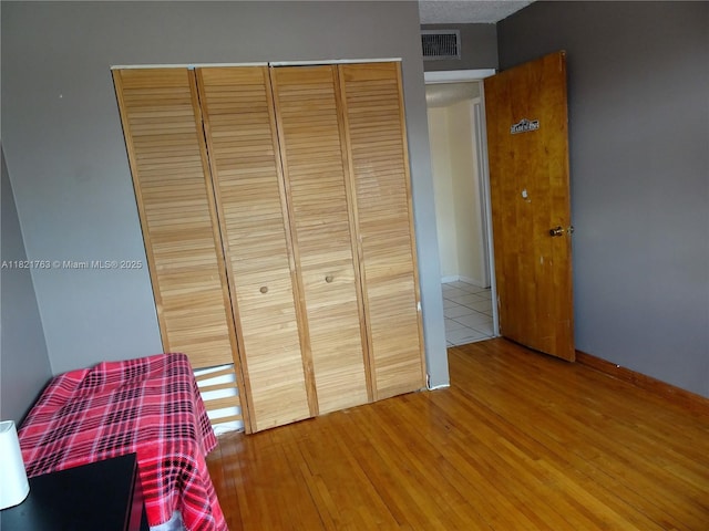 6680 SW 41st Pl Unit 32, Davie, FL 33314 - bedroom with a closet and wood finished floors