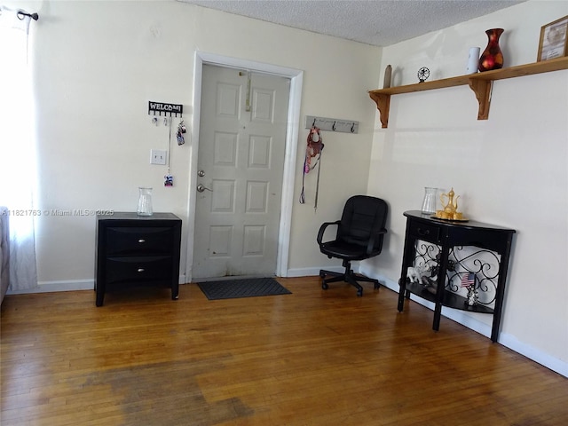 6680 SW 41st Pl Unit 32, Davie, FL 33314 - entrance foyer with wood finished floors and a textured ceiling