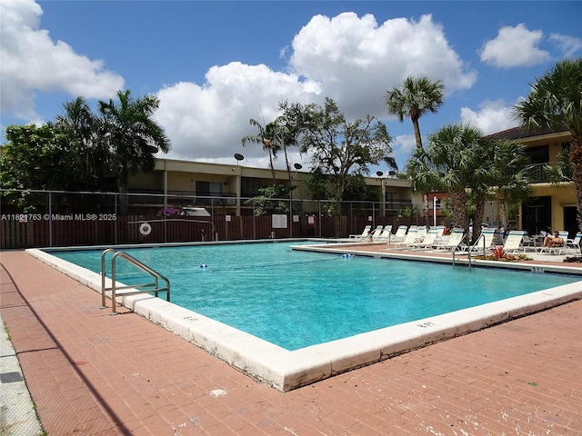 6680 SW 41st Pl Unit 32, Davie, FL 33314 - community pool featuring a patio area