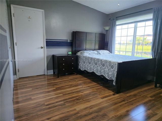 9410 S Meadows Cir, Miramar, FL 33025 - bedroom with dark wood finished floors and baseboards