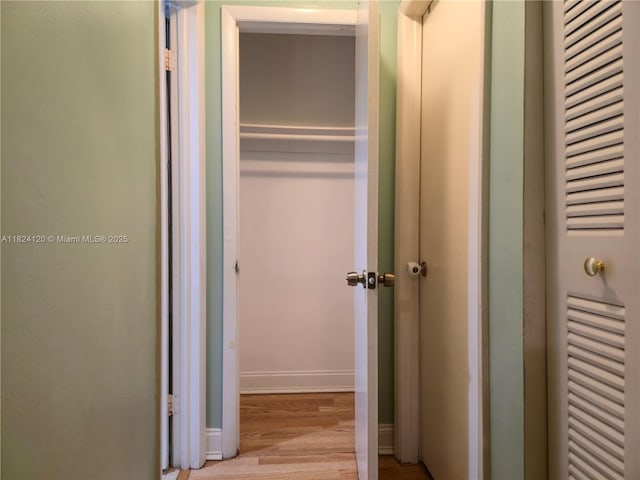 9410 S Meadows Cir, Miramar, FL 33025 - corridor featuring wood finished floors and baseboards