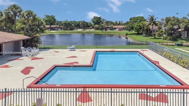 9410 S Meadows Cir, Miramar, FL 33025 - community pool with a water view and a patio