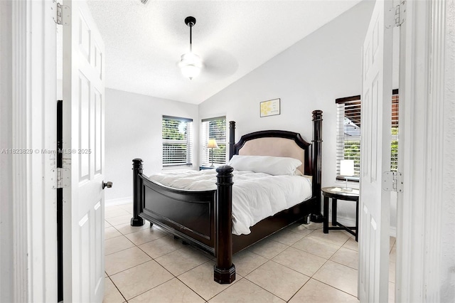 550 NW 107th Ave, Pembroke Pines, FL 33026 - bedroom with lofted ceiling, light tile patterned floors, and a ceiling fan