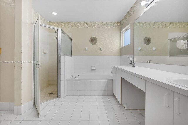 550 NW 107th Ave, Pembroke Pines, FL 33026 - full bathroom featuring a garden tub, a shower stall, tile patterned flooring, and double vanity