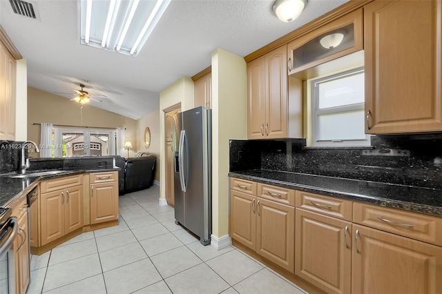 550 NW 107th Ave, Pembroke Pines, FL 33026 - kitchen featuring stainless steel fridge with ice dispenser, tasteful backsplash, light tile patterned floors, ceiling fan, and vaulted ceiling