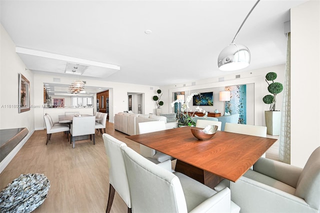 2711 S Ocean Dr Unit 3003, Hollywood, FL 33019 - dining space with light wood-style floors