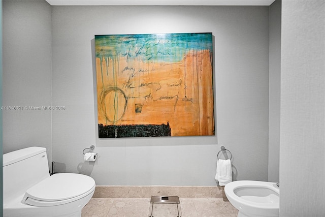 2711 S Ocean Dr Unit 3003, Hollywood, FL 33019 - half bath with a bidet and tile patterned flooring