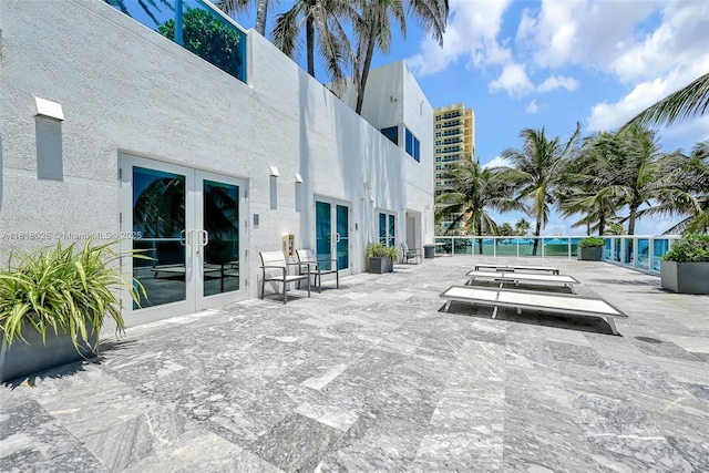 2711 S Ocean Dr Unit 203, Hollywood, FL 33019 - view of swimming pool featuring french doors and a patio