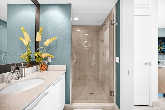 2711 S Ocean Dr Unit 203, Hollywood, FL 33019 - full bathroom with a stall shower, vanity, tile patterned floors, and recessed lighting