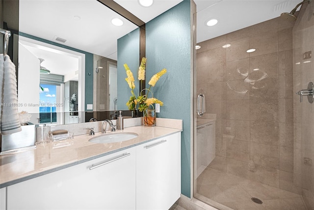 2711 S Ocean Dr Unit 203, Hollywood, FL 33019 - bathroom featuring a shower stall, vanity, and recessed lighting