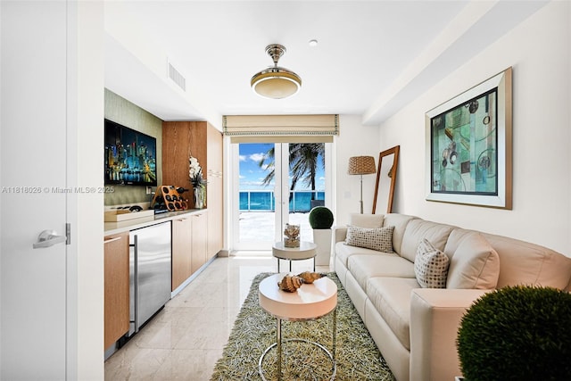 2711 S Ocean Dr Unit 203, Hollywood, FL 33019 - living room featuring light marble finish floors and bar area