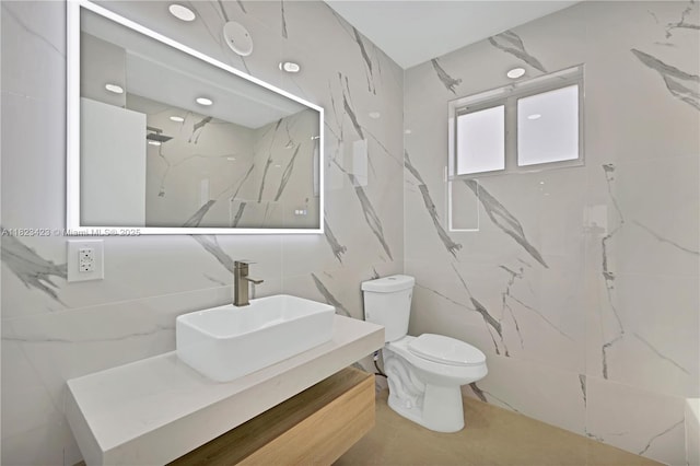 3917 Adams St, Hollywood, FL 33021 - full bathroom featuring tile walls, vanity, and a marble finish shower