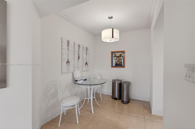 140 SE 5th Ave Unit 438, Boca Raton, FL 33432 - dining room with crown molding and light tile patterned floors