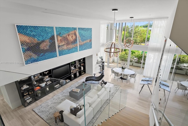 4701 N Meridian Ave Unit 217, Miami Beach, FL 33140 - living area featuring expansive windows and healthy amount of natural light