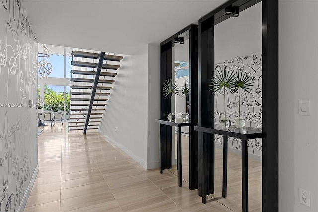 4701 N Meridian Ave Unit 217, Miami Beach, FL 33140 - hallway featuring healthy amount of natural light and expansive windows