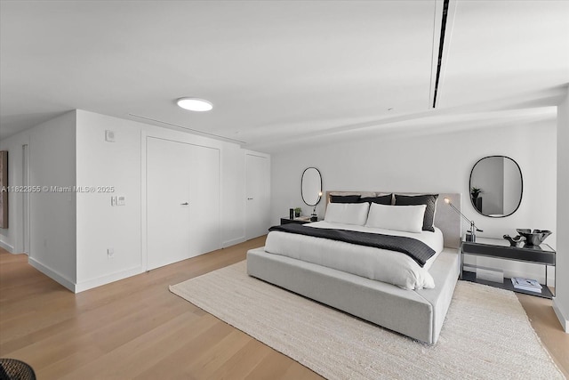4701 N Meridian Ave Unit 217, Miami Beach, FL 33140 - bedroom with wood finished floors and baseboards