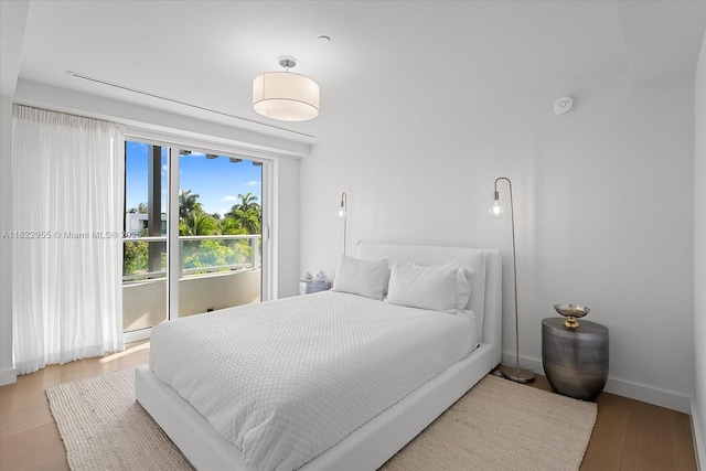 4701 N Meridian Ave Unit 217, Miami Beach, FL 33140 - bedroom featuring wood finished floors and baseboards