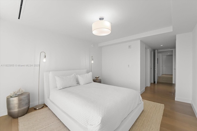 4701 N Meridian Ave Unit 217, Miami Beach, FL 33140 - bedroom featuring wood finished floors and baseboards