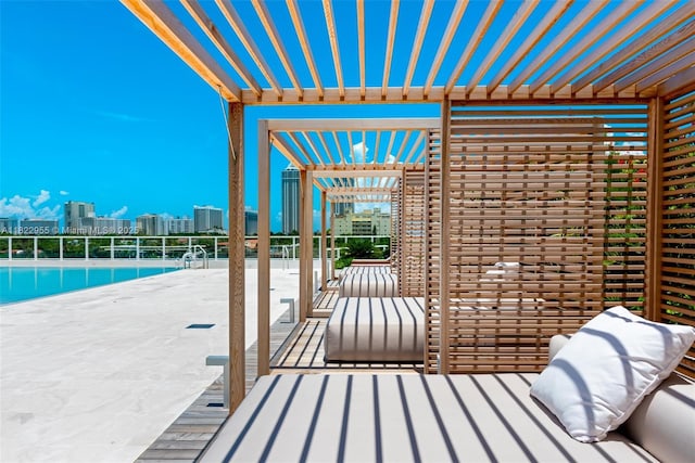 4701 N Meridian Ave Unit 217, Miami Beach, FL 33140 - wooden terrace featuring a community pool