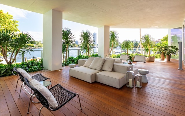 4701 N Meridian Ave Unit 217, Miami Beach, FL 33140 - wooden terrace featuring an outdoor hangout area and a water view