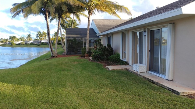 585 SE 25th Ln, Homestead, FL 33033 - view of grassy yard featuring a water view