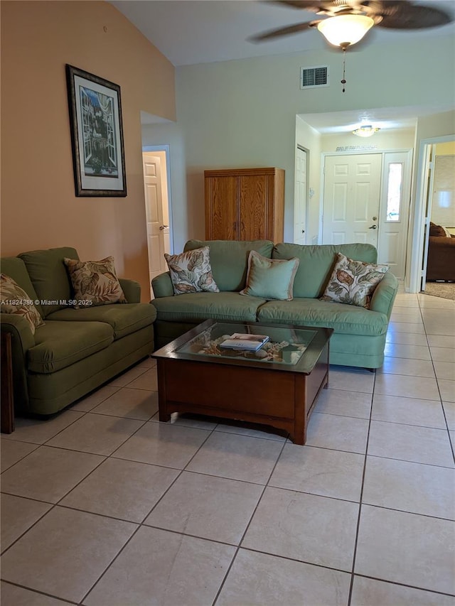 585 SE 25th Ln, Homestead, FL 33033 - living area with light tile patterned floors, ceiling fan, and vaulted ceiling