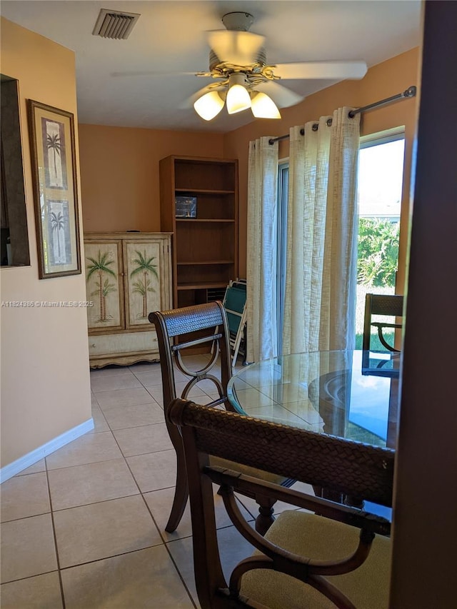 585 SE 25th Ln, Homestead, FL 33033 - dining area featuring light tile patterned floors and a ceiling fan