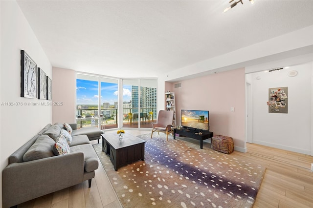 1900 N Bayshore Dr Unit 2514, Miami, FL 33132 - living area with hardwood / wood-style flooring and expansive windows