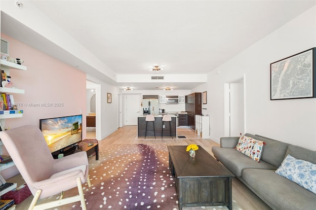 1900 N Bayshore Dr Unit 2514, Miami, FL 33132 - living area featuring light wood finished floors and arched walkways