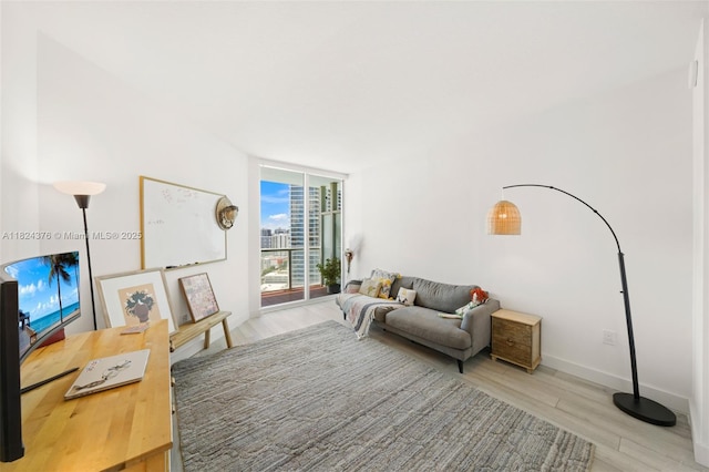 1900 N Bayshore Dr Unit 2514, Miami, FL 33132 - living room with wood finished floors and a wall of windows